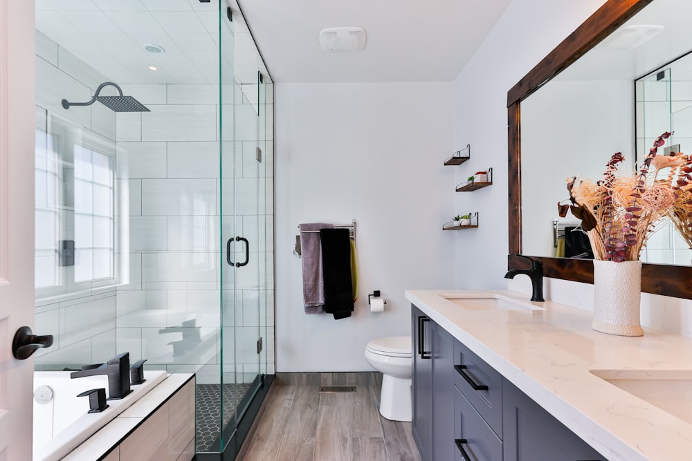 Bathroom with tiled shower enclosure and vanity unit